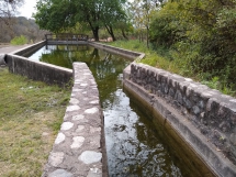 Obras de reconstrucción del dique San Ignacio en la cocha.